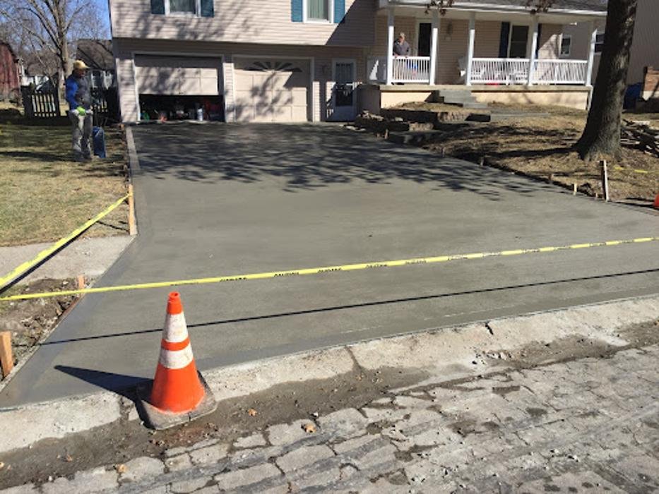 Concrete driveway installation in Oak Grove, MO — base preparation and forming before the pour